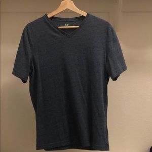 Men’s blue V neck T shirt.